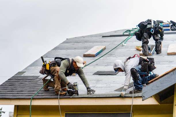 Professional Roofing technician working in Morris, CT